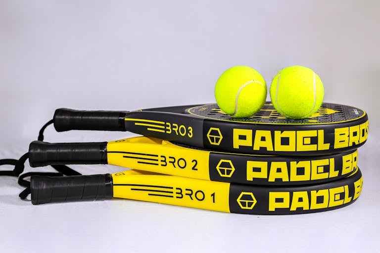 Tennis Balls on Rackets