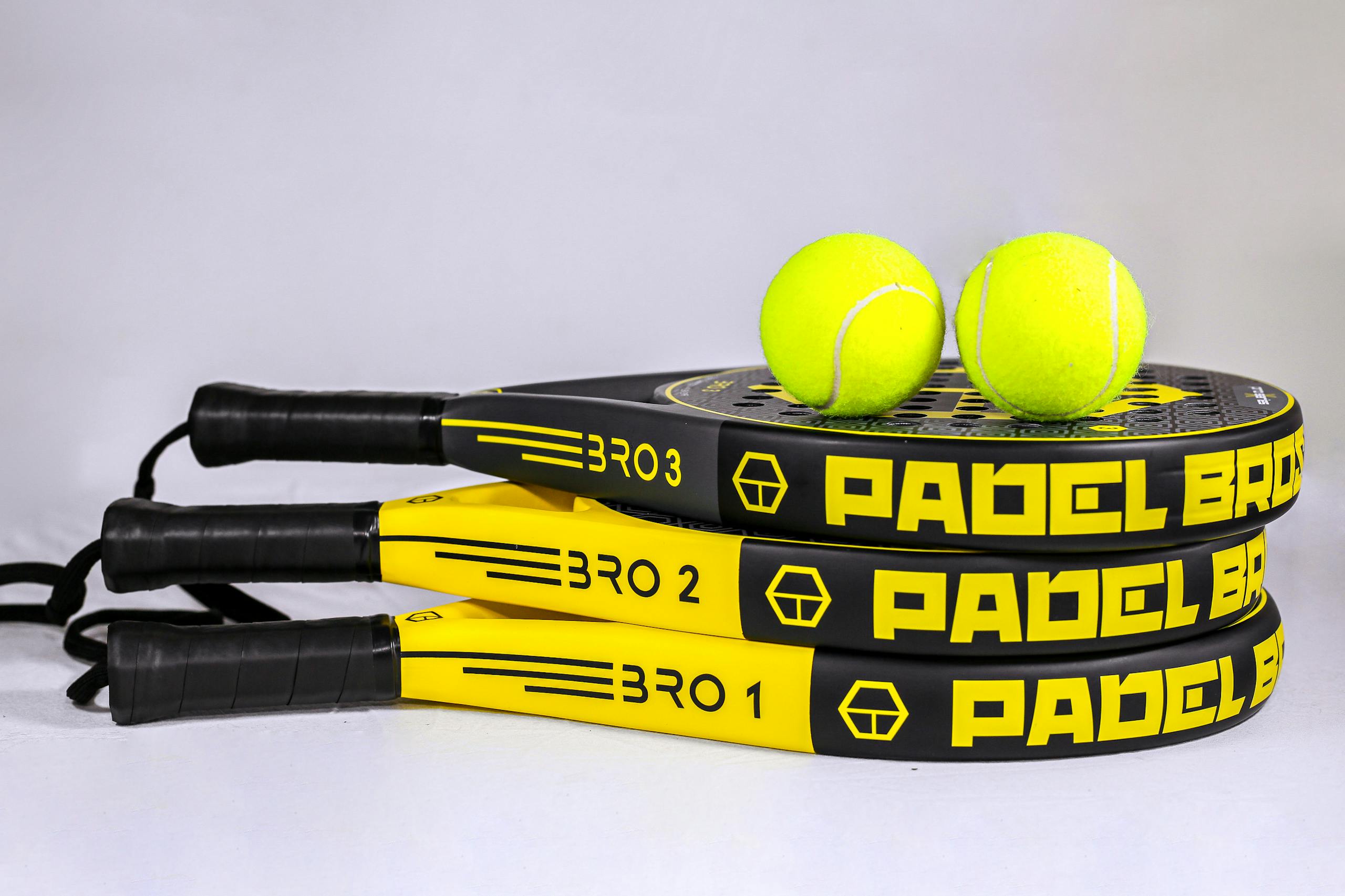 Tennis Balls on Rackets